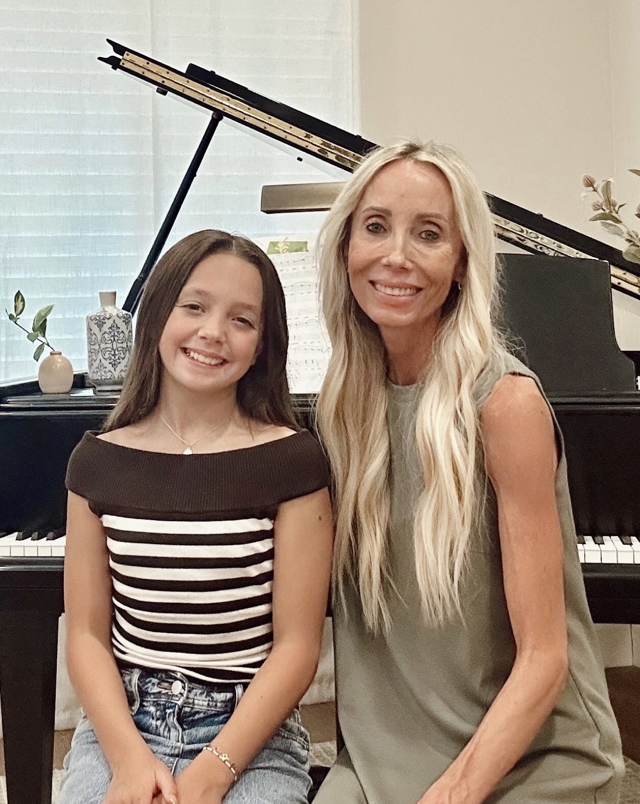 Julie Durrant with a student at the piano