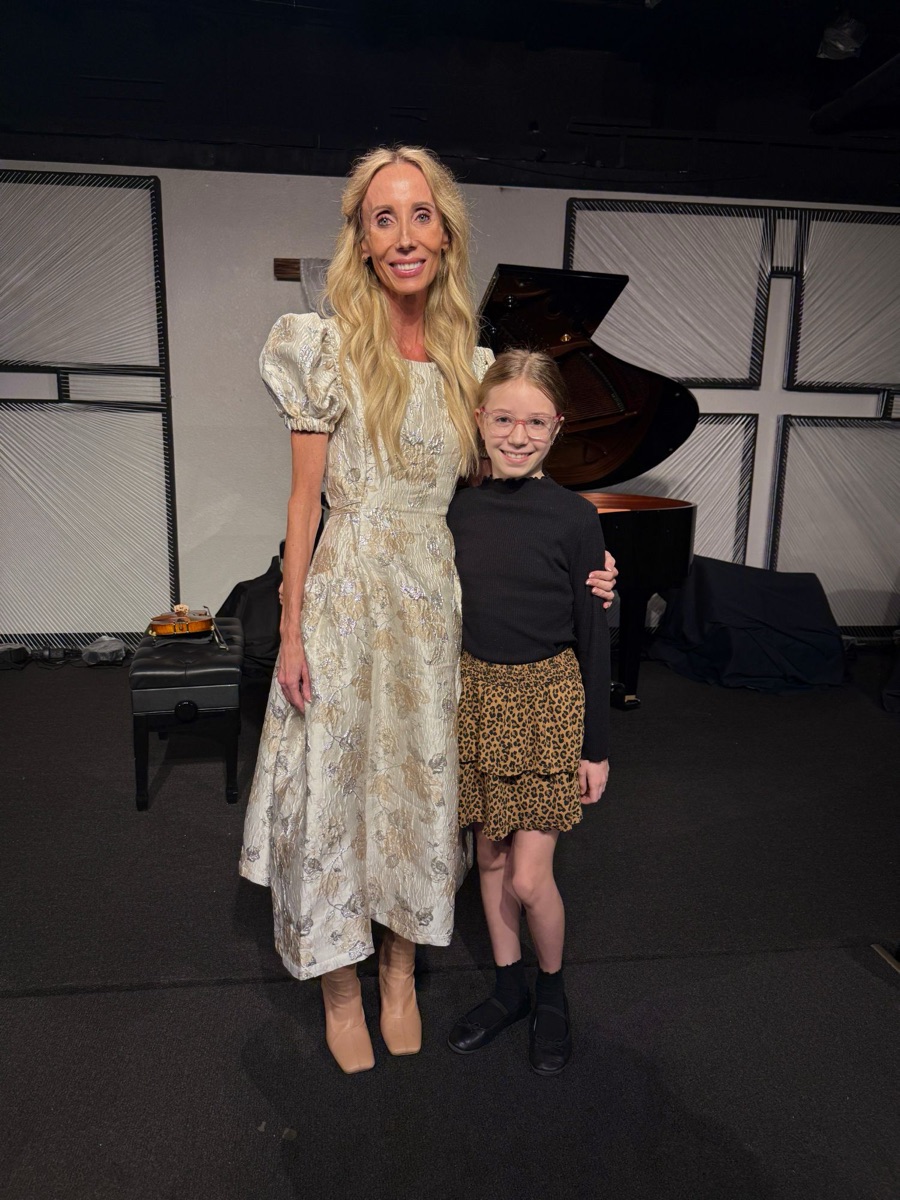 Julie Durrant with a student at a recital